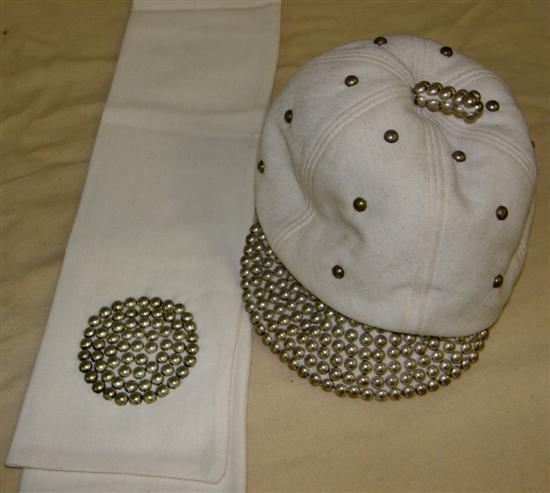 Appraisal: A GRAHAM SMITH FOR FORTNUM MASON WHITE JERSEY CAP with