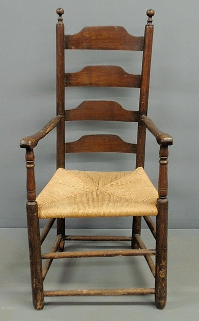 Appraisal: Pennsylvania primitive four-slat oak armchair th thc with a rush