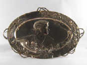 Appraisal: WMF A cast metal two handled tray in the Art