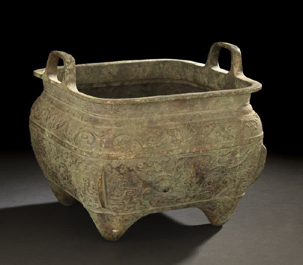 Appraisal: Chinese Cast-Bronze Footed Planter th century cast with low-relief designs