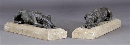 Appraisal: PAIR OF SOLID CAST LEAD FIGURES OF WHIPPETS Each raised