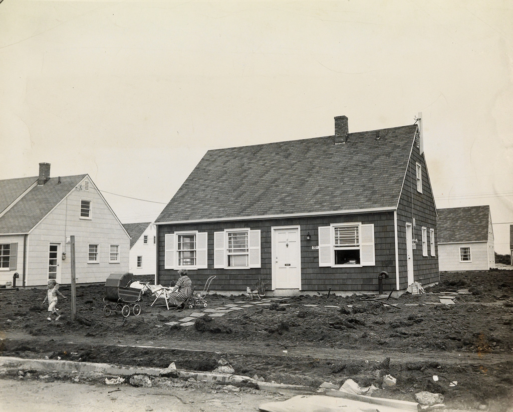 Appraisal: SUBURBS Post-war scene of a housewife and her children in