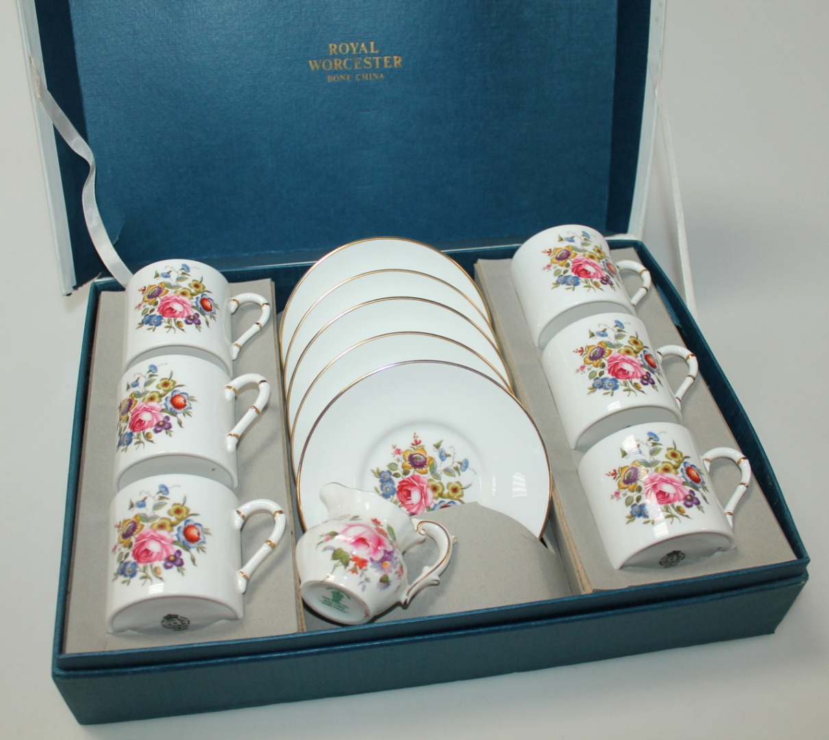 Appraisal: A thC Royal Worcester bone china cased coffee service comprising