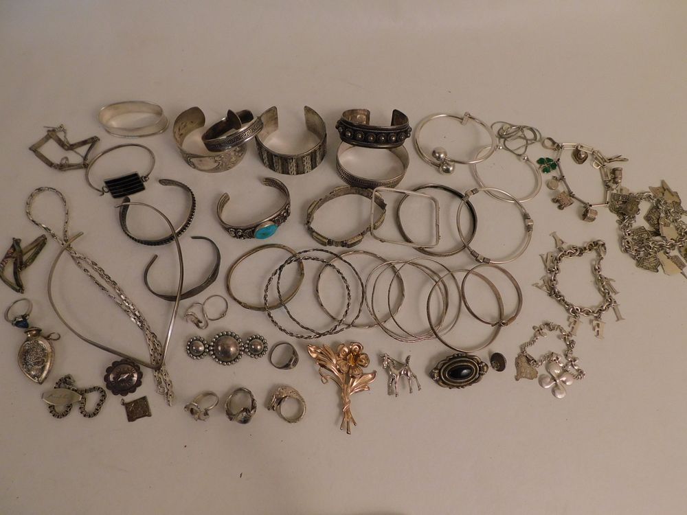 Appraisal: LOT SILVER JEWELRY CHARM BRACELETS Lot of sterling silver jewelry