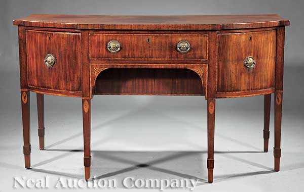 Appraisal: A George III Inlaid Mahogany Sideboard shaped top above conforming