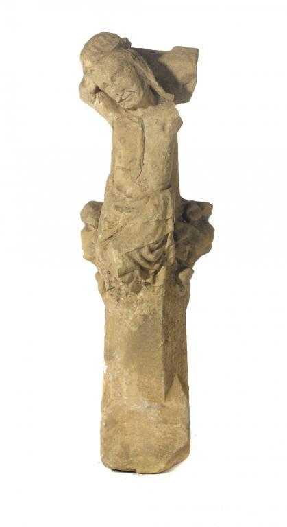 Appraisal: A GOTHIC LIMESTONE ARCHITECTURAL FRAGMENT carved with the head and