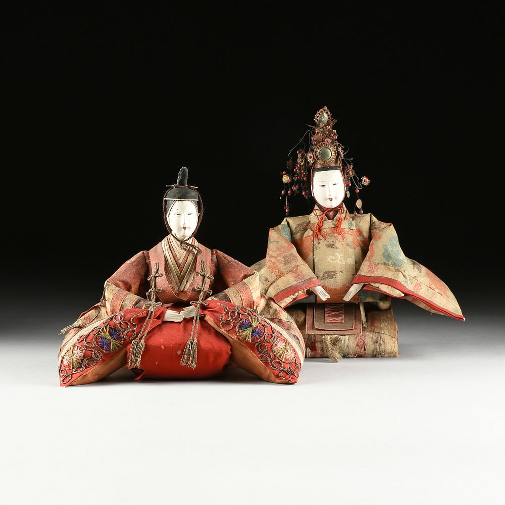 Appraisal: A PAIR OF JAPANESE HINAMATSURI DOLLS IN TRADITIONAL HEIAN DRESS