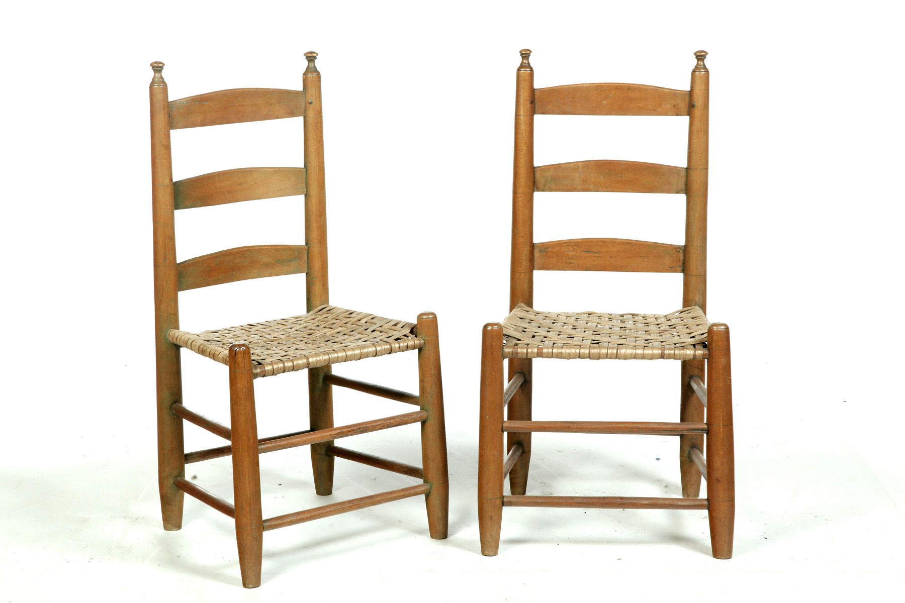 Appraisal: FOUR AMERICAN SIDE CHAIRS Late th-early th century Ladderbacks with