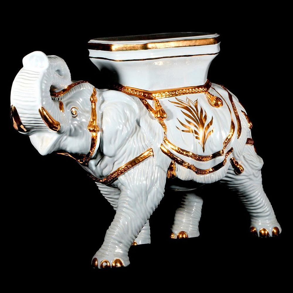 Appraisal: A porcelain elephant A blue porcelain and gilt elephant stand