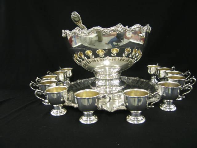 Appraisal: Silverplate Punch Set ornate bowl with matching tray and pedestal