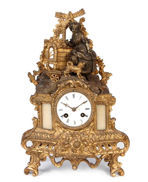 Appraisal: A French gilt and patinated bronze mantel clock th century