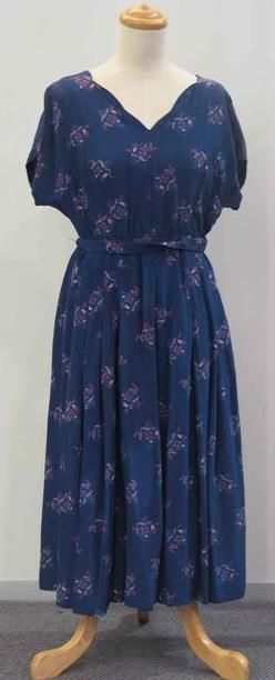 Appraisal: Day dress in navy rayon printed with floral bouquet self