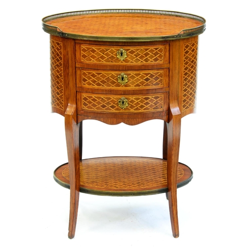 Appraisal: A French oval kingwood and tulipwood trellis parquetry table en