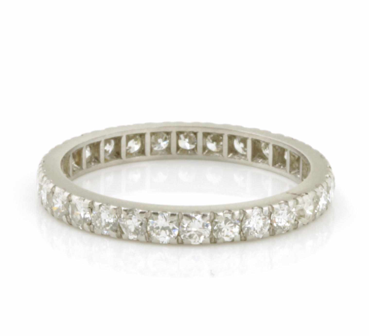 Appraisal: A diamond and platinum eternity band estimated total diamond weight