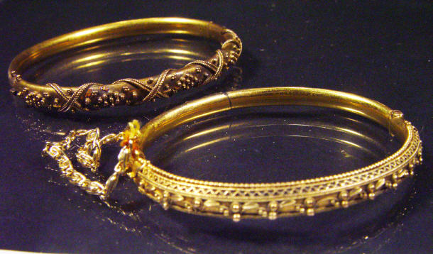 Appraisal: ct gold child's bangle and a rolled gold bangle