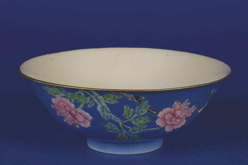 Appraisal: A CHINESE BOWL sparsely decorated in polychrome with a branch