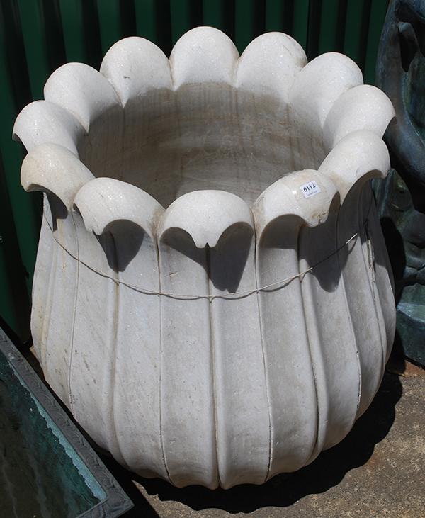 Appraisal: TWO CARVED MARBLE LOTUS POTS cm high