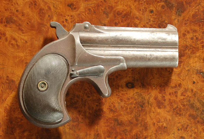 Appraisal: REMINGTON OVER UNDER DERRINGER rimfire caliber barrels with slant REMINGTON