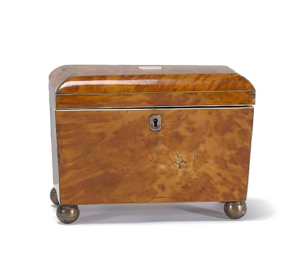 Appraisal: A Regency blonde tortoiseshell tea caddy inlaid with silvered stringing