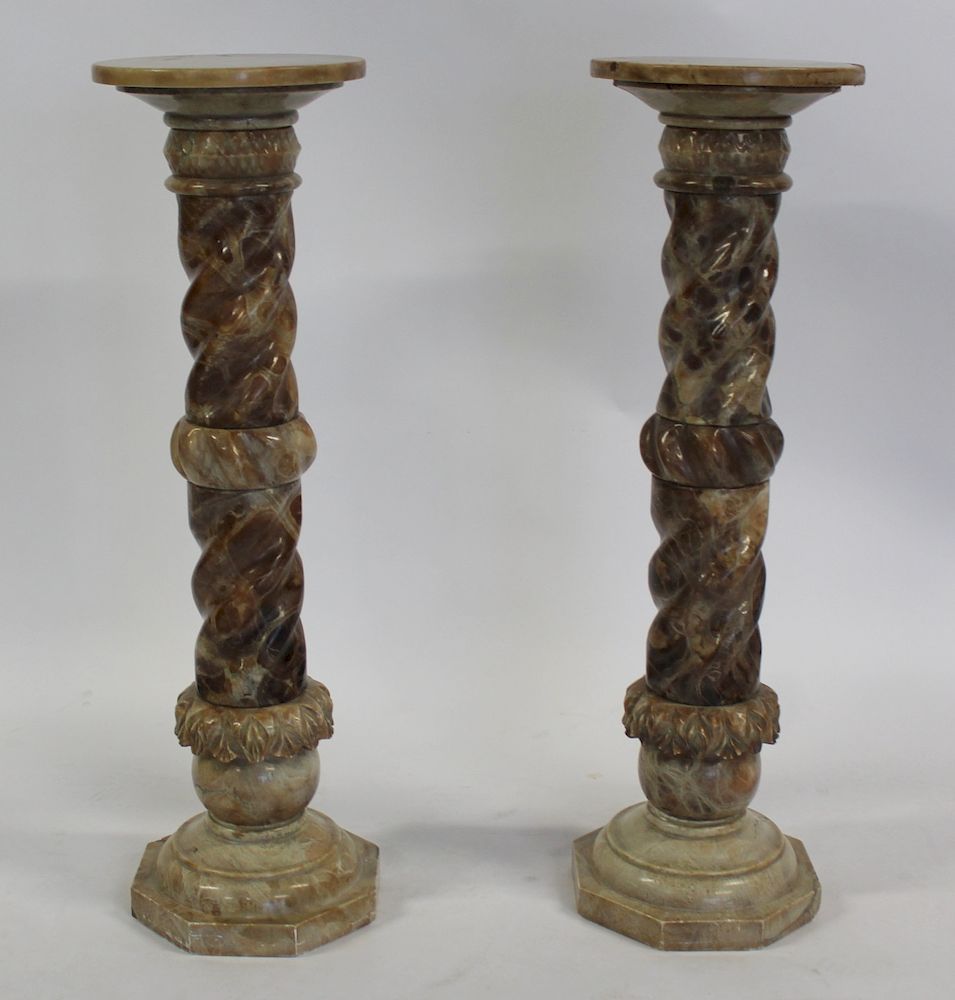 Appraisal: An Antique Pair of Twist Column Two Tone Marble Pedestals