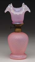 Appraisal: PINK OPALINE MINI LAMP Unlisted Upturned ruffled shade and base