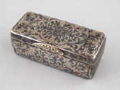 Appraisal: A Russian silver box with engraved scrolling inset with niello