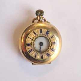 Appraisal: A lady's pocket watch with white dial and Roman numerals