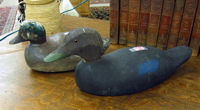 Appraisal: TWO HAND CARVED DUCK DECOYS a stylized canvas back with