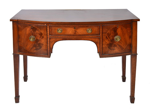 Appraisal: A GEORGIAN STYLE MAHOGANY BOW FRONT SIDEBOARD with single drawer