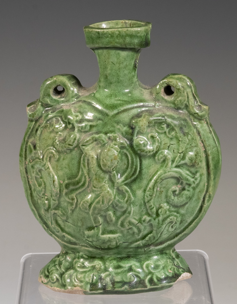 Appraisal: CHINESE TANG DYNASTY - GREEN GLAZED EARTHENWARE CANTEEN Both sides