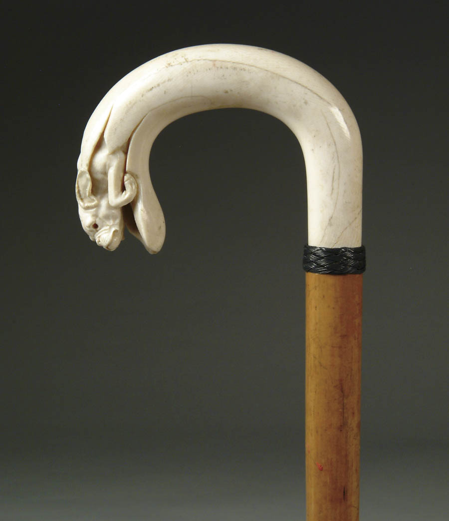 Appraisal: FINE CARVED IVORY CROOK HANDLE DOG CANE Ivory crook handle