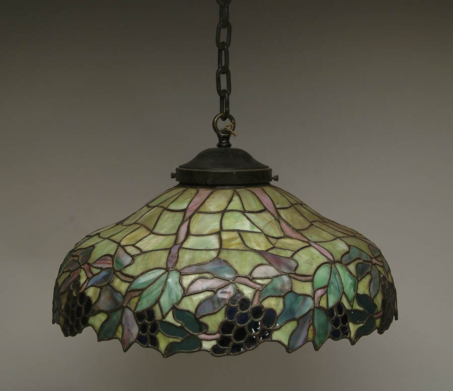 Appraisal: LEADED CHANDELIER Leaded chandelier has freeform panels of green background