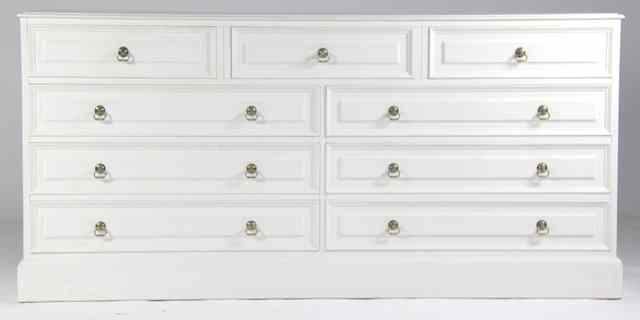 Appraisal: A modern painted pine dresser of three short drawers above