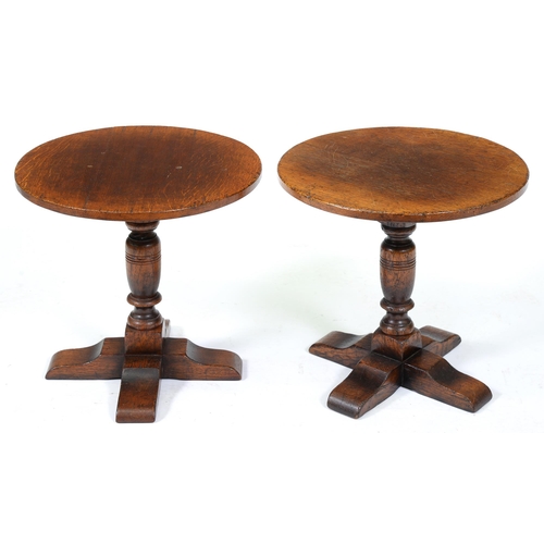 Appraisal: A pair of Titchmarsh Goodwin oak pedestal tables cm h