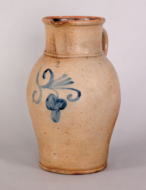 Appraisal: Two gallon stoneware pitcher th c with cobalt floral decoration