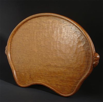 Appraisal: A Robert 'Mouseman' Thompson oak tray kidney shape adzed finish