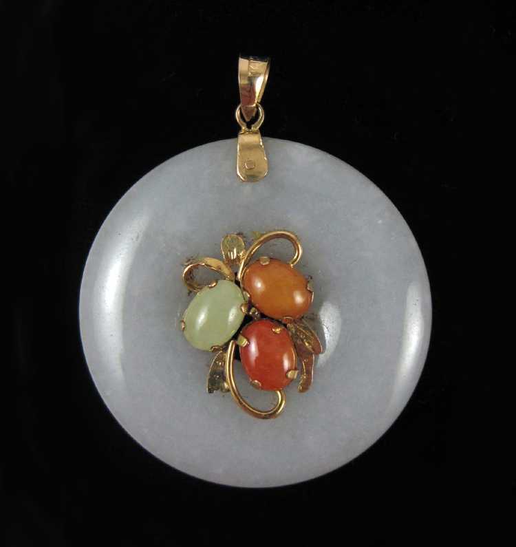 Appraisal: JADE AND FOURTEEN KARAT GOLD PENDANT with a lavender jade