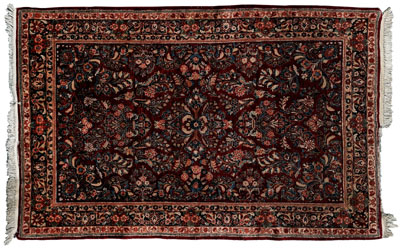 Appraisal: Modern Sarouk rug floral designs on burgundy field ft in