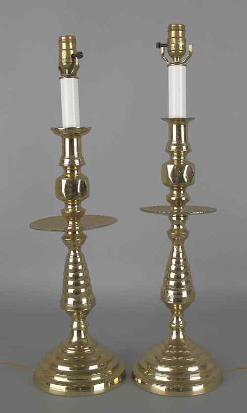 Appraisal: Large pair of brass candlestick table lamps th c h