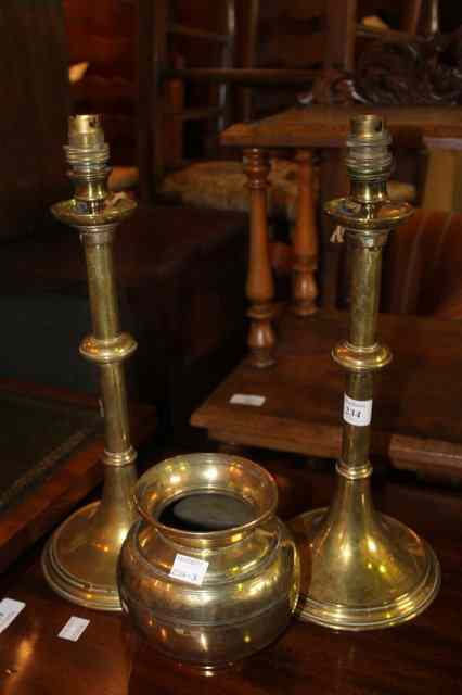 Appraisal: A PAIR OF BRASS COLUMN CANDLE STICKS converted to electricity