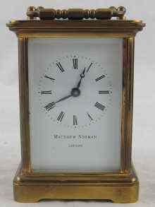 Appraisal: A modern brass carriage clock Matthew Norman London