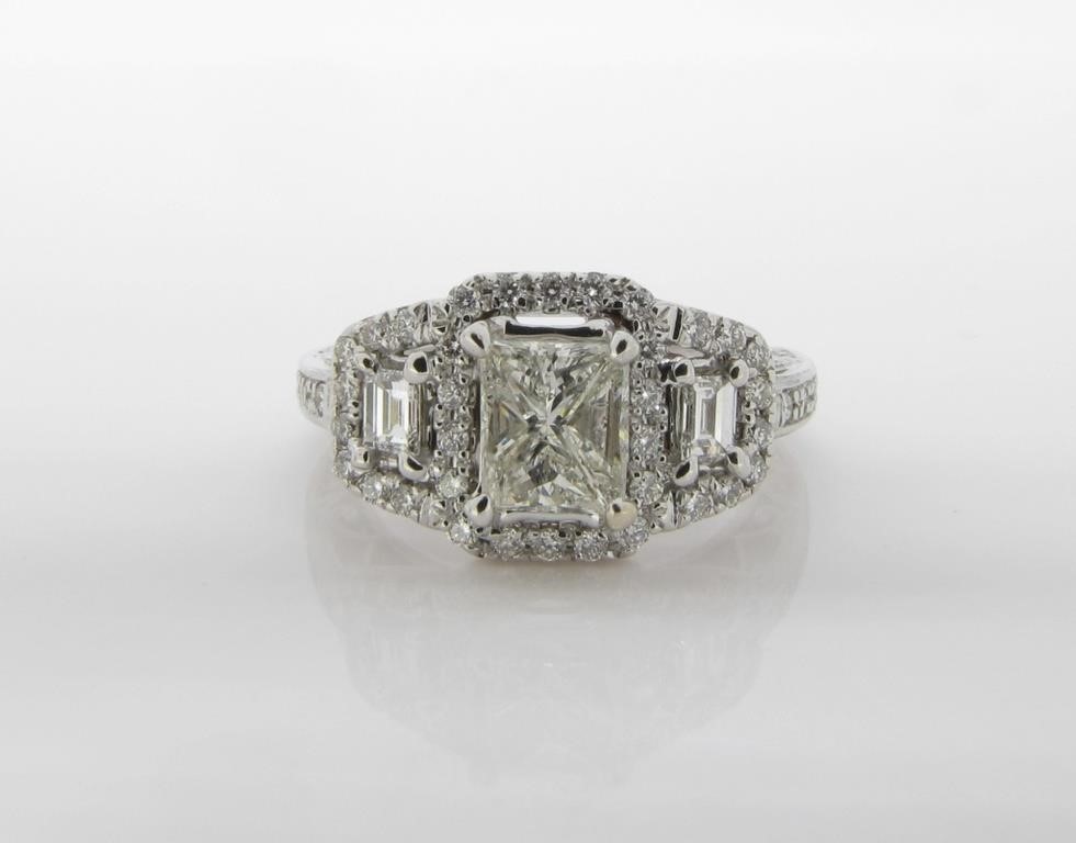 Appraisal: A K white gold ring with a radiant cut center