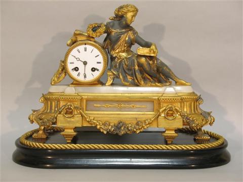 Appraisal: GILT-BRONZE AND WHITE MARBLE MANTEL CLOCK Finely cast as a