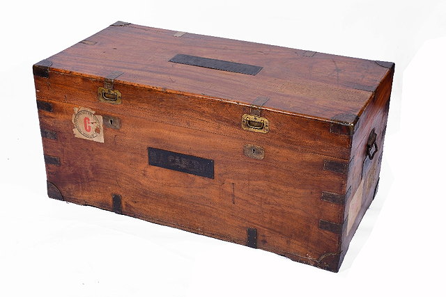 Appraisal: A TH CENTURY COLONIAL TEAK AND CAMPHORWOOD TRAVELLING TRUNK brass