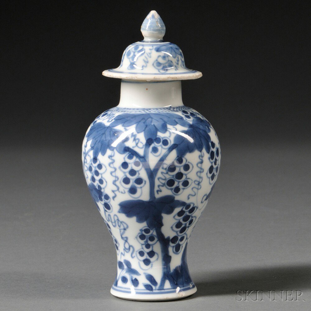 Appraisal: Blue and White Miniature Covered Jar China baluster form painted