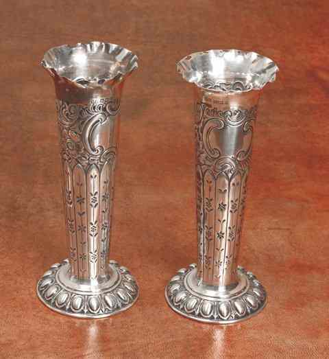 Appraisal: A PAIR OF GEORGE V SILVER TRUMPET VASES with pressed