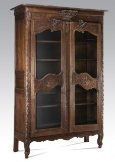 Appraisal: th c French Provincial carved oak vitrine French Provincial carved