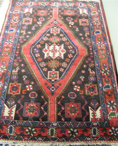 Appraisal: TWO PERSIAN AREA RUGS ' X ' tribal and a