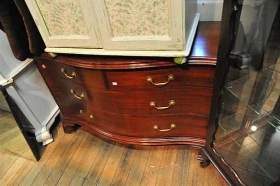 Appraisal: A LARGE SERPENTINE FRONTED MAHOGANY FOUR DRAWER CHEST ONE HANDLE