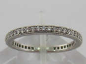 Appraisal: A Tiffany platinum and diamond eternity ring signed to inner